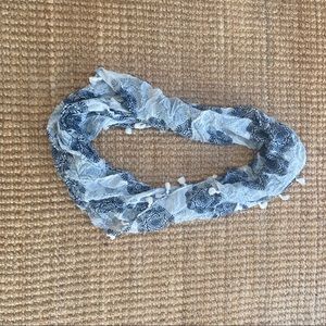 Blue and white patterned infinity scarf
